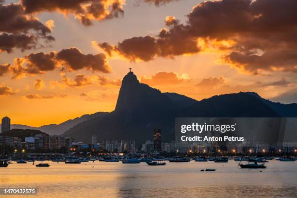 beautiful view of rio de janeiro at twilight, brazil. city view at sunset - brazil ocean stock-fotos und bilder