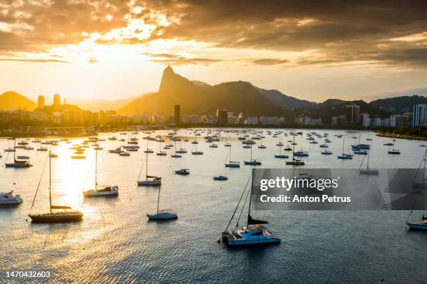 rio de janeiro at sunset, brazil. yachts at sunset - corcovado hill stock pictures, royalty-free photos & images