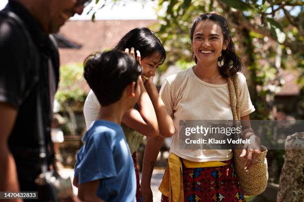 happy tourists enjoying together during vacation - 40s couple sunny stock pictures, royalty-free photos & images