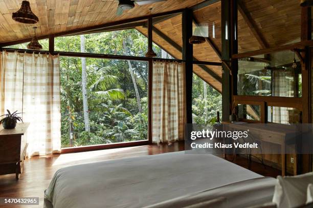 elegant bedroom with furniture at resort villa - casa in esposizione foto e immagini stock