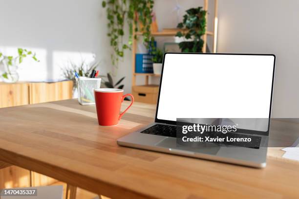 mockup image of laptop computer screen with blank white background for advertising text at bright modern home office. marketing and business concept - landing page stock pictures, royalty-free photos & images