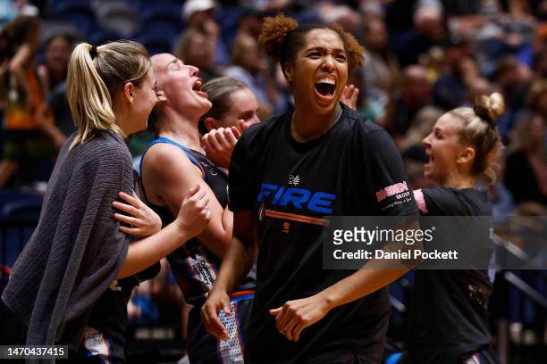 Tianna Hawkins of the Fire and teammates celebrate winning the round16 WNBL match between Bendigo Spirit and Townsville Fire at Red Energy Arena, on...