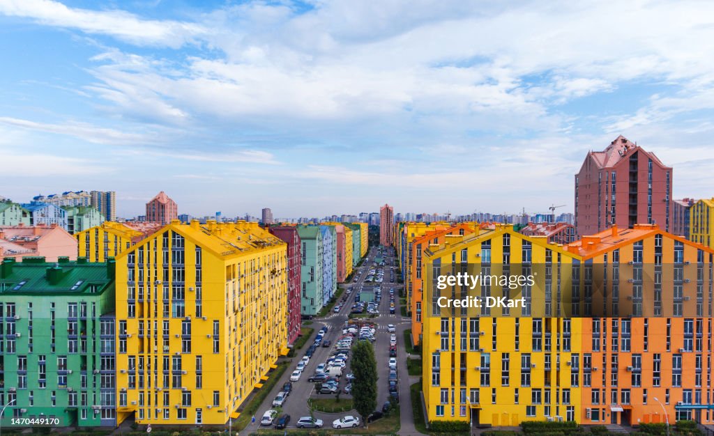 Aerial view of a residential complex with rainbow houses on the left bank of Kyiv