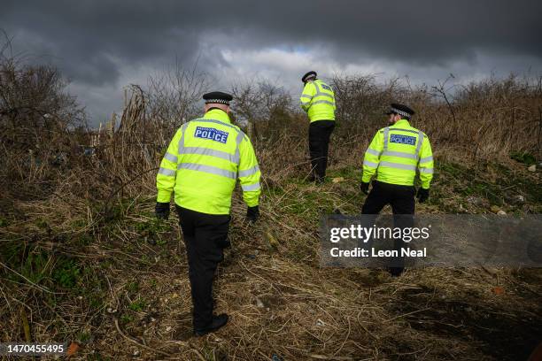 Police search team works through an allotment area as they continue to search for a missing baby on March 01, 2023 in Brighton, England. Police are...