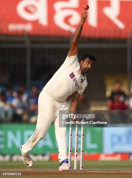 Ravichandran Ashwin of India bowls during day one of the Third Test match in the series between India and Australia at Holkare Cricket Stadium on...