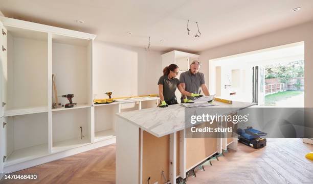 kitchen install blueprints - countertop installation stock pictures, royalty-free photos & images