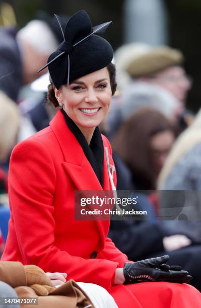 Catherine, Princess of Wales smiles in the audience during a visit to the 1st Battalion Welsh Guards at Combermere Barracks for the St David’s Day...