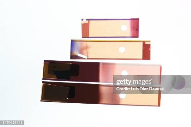 color negative 110 mm film stripes stacked - film negitive stock pictures, royalty-free photos & images
