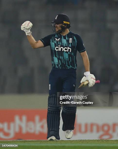 Dawid Malan of England celebrates reaching his century during the 1st One Day International between Bangladesh and England at Sher-e-Bangla National...