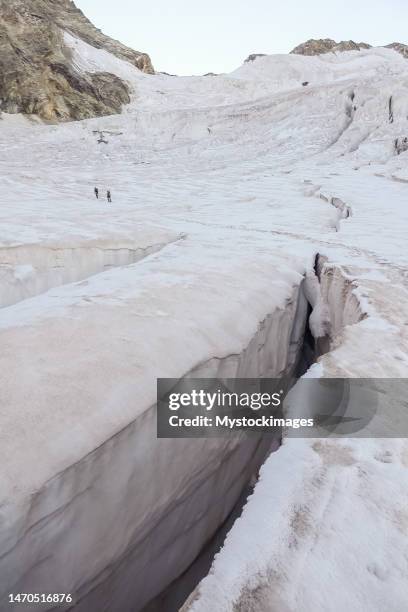 crevasse in glacier, switzerland - crevasse stock pictures, royalty-free photos & images