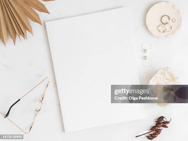 empty blank white magazine or catalog cover layout on white background. - magazine table ストックフォトと画像