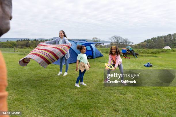 catching the frisbee - human age stock pictures, royalty-free photos & images