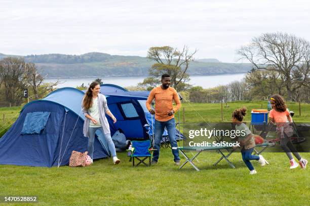 family camping trips - camping family stock pictures, royalty-free photos & images