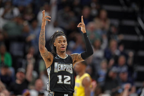 Ja Morant of the Memphis Grizzlies reacts during the game against the Los Angeles Lakers at FedExForum on February 28, 2023 in Memphis, Tennessee....