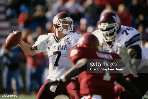 Matt Wyatt, Quarterback for the Mississippi State Bulldogs prepares to throw a pass downfield during the NCAA Southeastern Conference college...