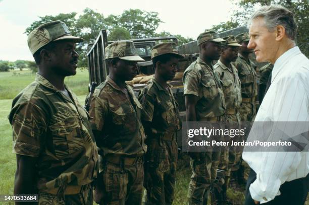 Prime Minister of Rhodesia, Ian Smith inspects troops from the Rhodesian Army, part of the Rhodesian Security Forces in Rhodesia in 1979.