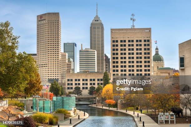 downtown city skyline view of indianapolis, indiana, usa looking over the central canal walk - indiana skyline stock pictures, royalty-free photos & images