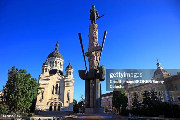 avram iancu statue and orthodox cathedral at the piata avram iancu in cluj, transylvania, romania - cluj napoca stock pictures, royalty-free photos & images