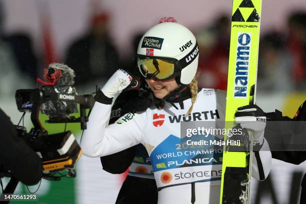 Silver medalist Maren Lundby of Norway celebrates after the Ski Jumping Women's Individual HS138 at the FIS Nordic World Ski Championships Planica on...