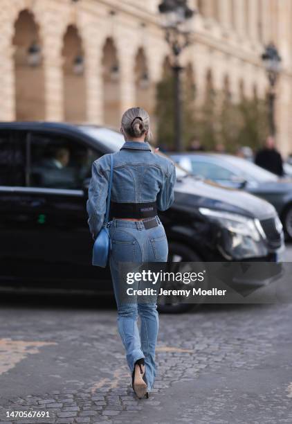 Saraja Roberta Elez seen wearing Mugler blue jeans denim cropped jacket, Mugler blue denim wide leg slit jeans pants, Jimmy Choo x Mugler black...