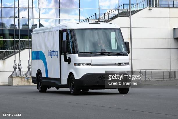 electric delivery van brightdrop on a street - tesla truck stock pictures, royalty-free photos & images
