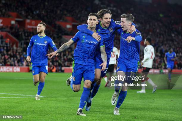 Gavan Holohan of Grimsby Town celebrates with team-mates after he scores a goal to make it 1-0 from the spot during the FA Cup Fifth Round match...