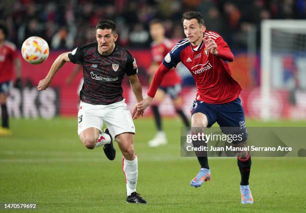 Daniel Vivian of Athletic Club battles for possession with Ante Budimir of CA Osasuna during the Copa Del Rey Semi-Final First Leg match between...