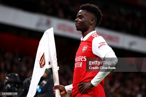 Bukayo Saka of Arsenal celebrates after scoring the team's first goal during the Premier League match between Arsenal FC and Everton FC at Emirates...