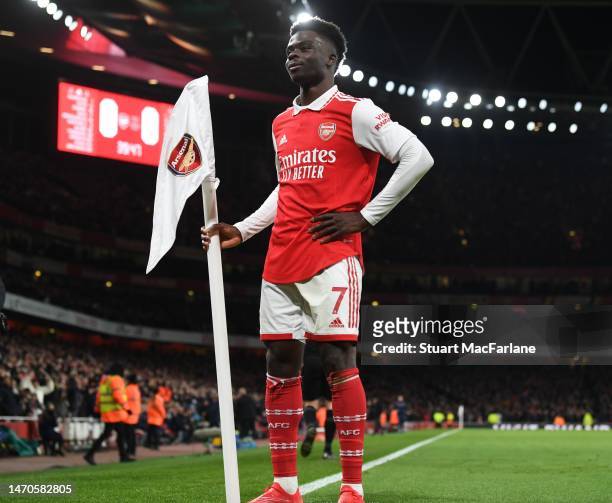 Bukayo Saka celebrates scoring the 1st Arsenal goal during the Premier League match between Arsenal FC and Everton FC at Emirates Stadium on March...