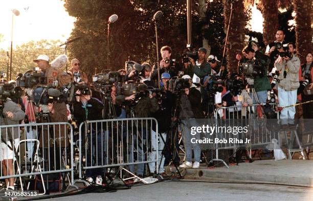 News Media representatives gather outside the Santa Monica Courthouse during the O.J. Simpson Trial, February 5, 1997 in Santa Monica, California.