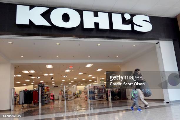 Sign hangs above the entrance of a Kohl's store on March 01, 2023 in Lincolnwood, Illinois. Kohl’s shares dropped today after reporting a 7.1...