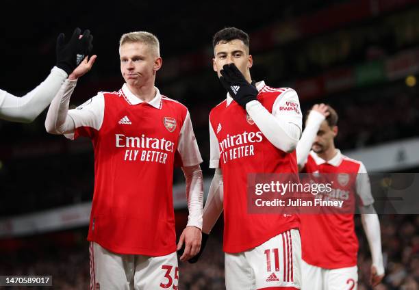 Gabriel Martinelli of Arsenal celebrates with teammate Oleksandr Zinchenko after scoring the team's fourth goal during the Premier League match...