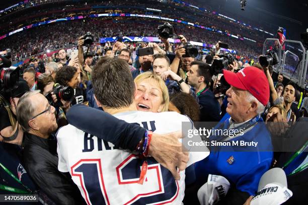 Tom Brady of the New England Patriots celebrates with his mother Galynn and father Tom Brady senior, after winning Super Bowl LIII at Mercedes-Benz...