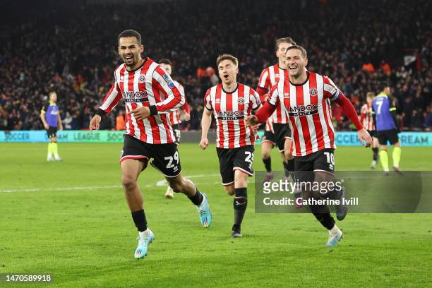 Iliman Ndiaye of Sheffield United celebrates with teammates after scoring the team's first goal during the Emirates FA Cup Fifth Round match between...