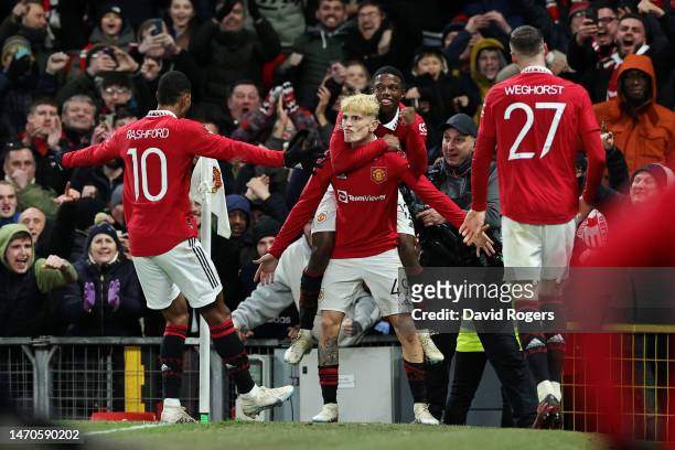 Alejandro Garnacho of Manchester United celebrates with teammates after scoring the team's second goal during the Emirates FA Cup Fifth Round match...