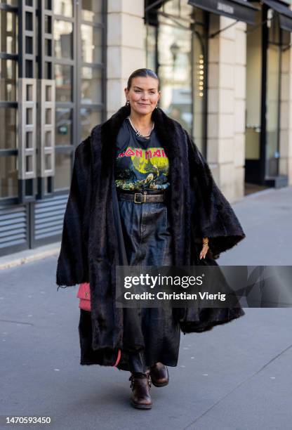 Janka Pollinai wears black coat, skirt outside The Row during Paris Fashion Week - Womenswear Fall Winter 2023 2024 : Day Three on March 01, 2023 in...