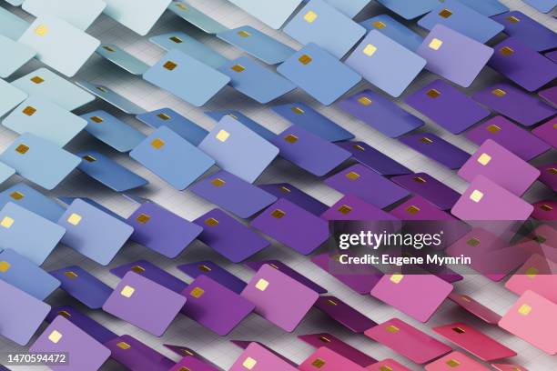 digitally generated image of isometric coloured credit cards - financial technology stock pictures, royalty-free photos & images