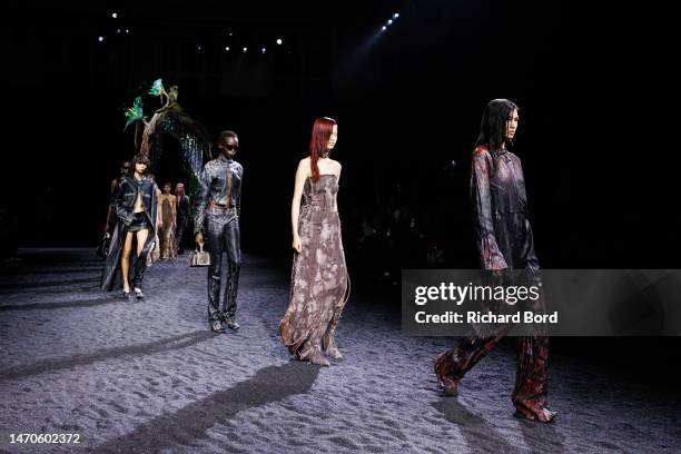 Models walk the runway during the Acne Studios Womenswear Fall Winter 2023-2024 show at Lycee Carnot as part of Paris Fashion Week on March 01, 2023...