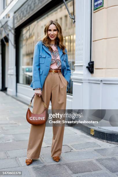 Alexandra Lapp wearing a during a street style shoot on February 28, 2023 in Paris, France.