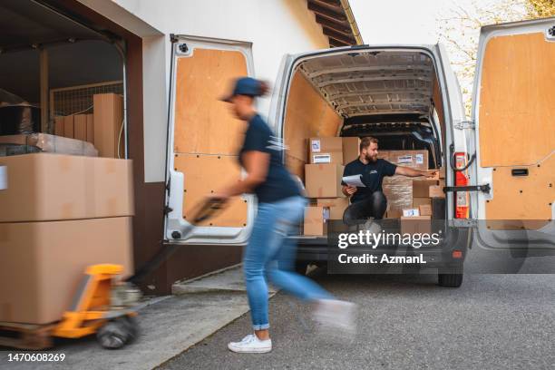 delivery team rush hour - post office stock pictures, royalty-free photos & images