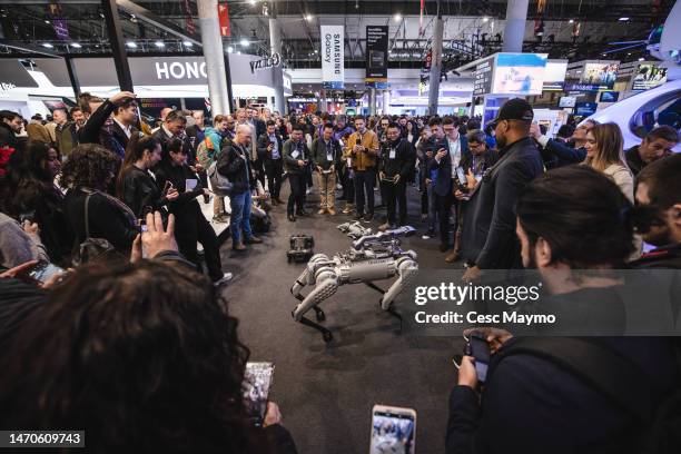 People look and take photos of a Boston Dynamics robot during the day 3 of the Mobile World Congress 2023 at Fira Barcelona on March 01, 2023 in...