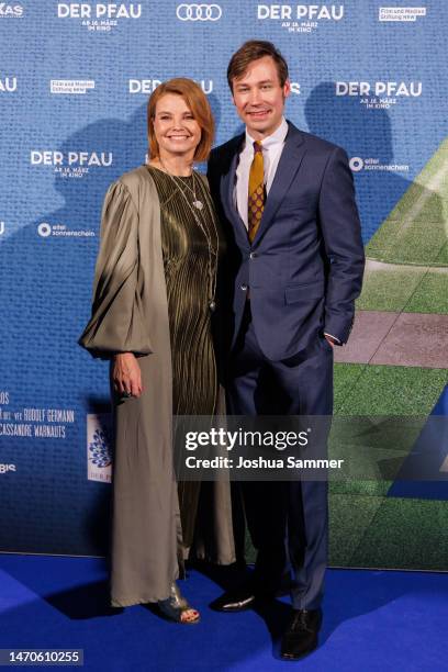 Annette Frier and David Kross attend the "Der Pfau" premiere at Cinedom on March 01, 2023 in Cologne, Germany.