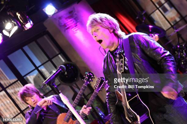 Richie Sambora and Jon Bon Jovi of Bon Jovi performing on a TV program on December 18, 2008 in New York City.