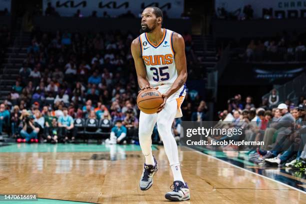 Kevin Durant of the Phoenix Suns looks to shoot in the second quarter during their game against the Charlotte Hornets at Spectrum Center on March 01,...