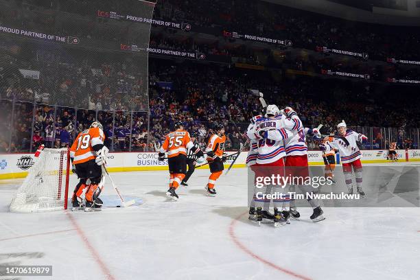 The New York Rangers celebrate a goal by Mika Zibanejad during the first period against the Philadelphia Flyers at Wells Fargo Center on March 01,...