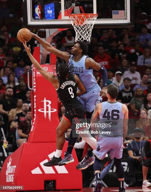 Josh Christopher of the Houston Rockets has his shot blocked by Jaren Jackson Jr. #13 of the Memphis Grizzlies during the second quarter at Toyota...