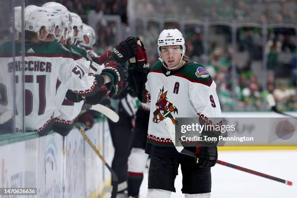 Clayton Keller of the Arizona Coyotes celebrates after scoring a goal against the Dallas Stars in the first period at American Airlines Center on...