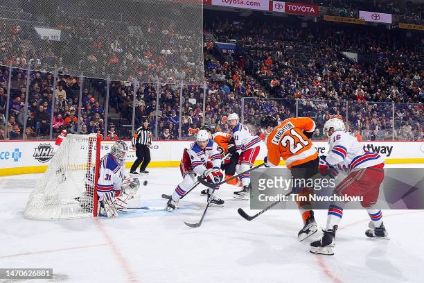 Scott Laughton of the Philadelphia Flyers shoots to score past Igor Shesterkin of the New York Rangers during the second period at Wells Fargo Center...