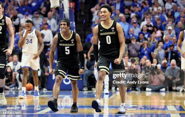 Ezra Manjon and Tyrin Lawrence of the Vanderbilt Commodores celebrate after the game winning shot by Jordan Wright in the final seconds of the 68-66...