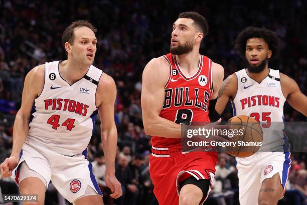 Zach LaVine of the Chicago Bulls drives around Bojan Bogdanovic of the Detroit Pistons during the second half at Little Caesars Arena on March 01,...